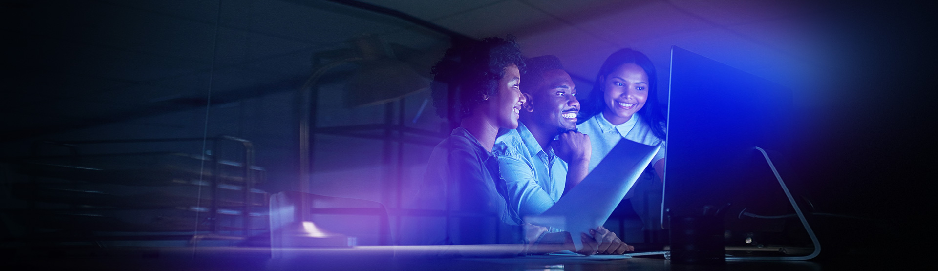 Group of professionals reviewing a laptop in a modern office, with a blue and purple light overlay and digital-style background effects.