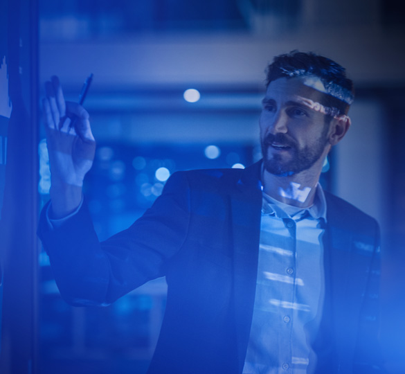 Person writing on glass board in office with blue lighting overlay