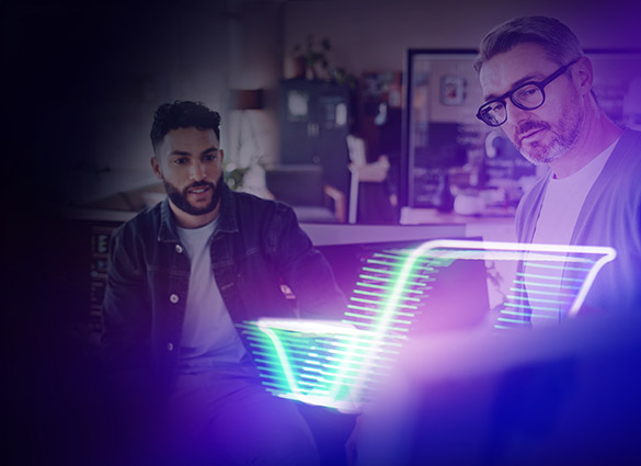 two people working together to solve a problem in business
