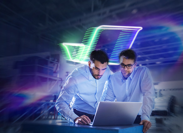 Two professionals collaborating on a laptop with neon light in background showing flydocs logo